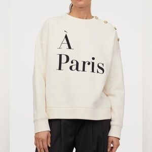 H&M Cream A Paris Graphic Sweatshirt with Button Shoulder Detail